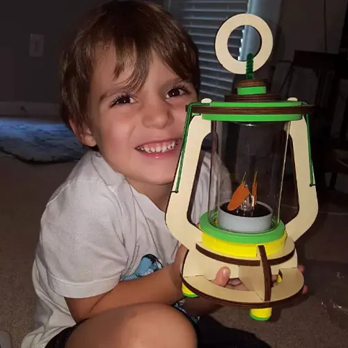 kid playing with solar lantern